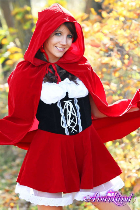 Cute teen Andi Land frees her boobies and cunt from a Red Riding Hood outfit