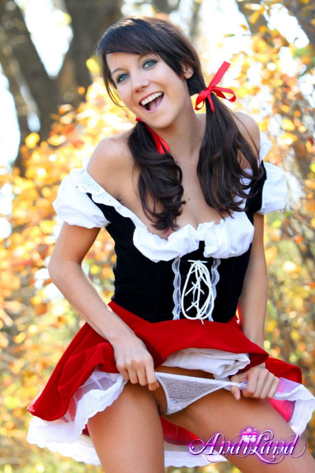 Cute teen Andi Land frees her boobies and cunt from a Red Riding Hood outfit