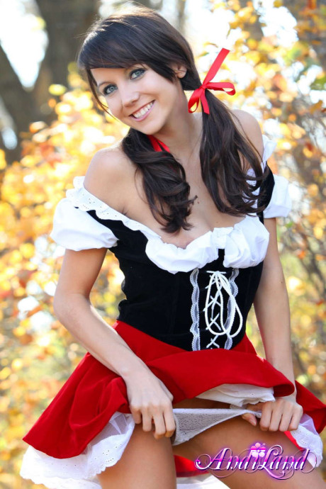 Cute teen Andi Land frees her boobies and cunt from a Red Riding Hood outfit
