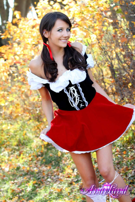 Cute teen Andi Land frees her boobies and cunt from a Red Riding Hood outfit