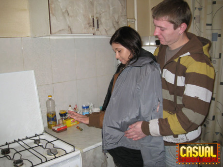 Teen lovers engage in a hard couples fuck in the cuisine
