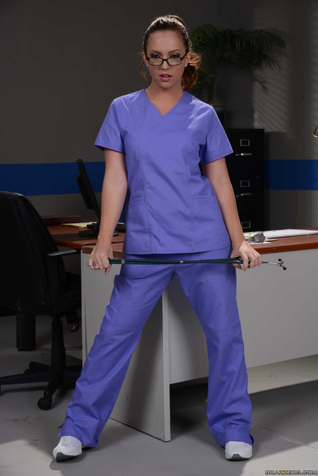 Ginger Head nurse Maddy Oreilly strips in hospital to show her skinny body
