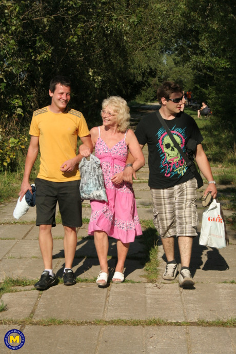 Old whore Margrit K getting banged and facialed in a public swingers party