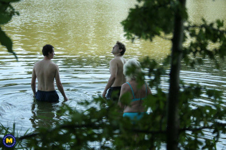 Old whore Margrit K getting banged and facialed in a public swingers party