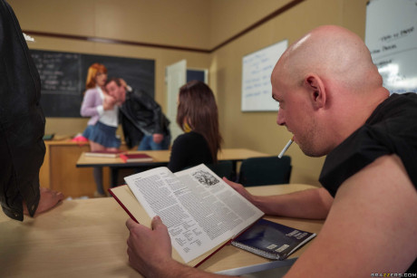 Redheaded teacher Penny Pax has sex with a male student during class