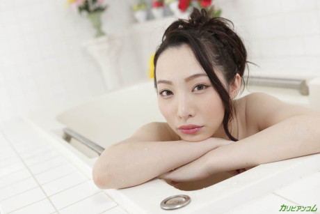 Attractive asian babe Hasumi Yoshioka shows her creampied snatch after having sex