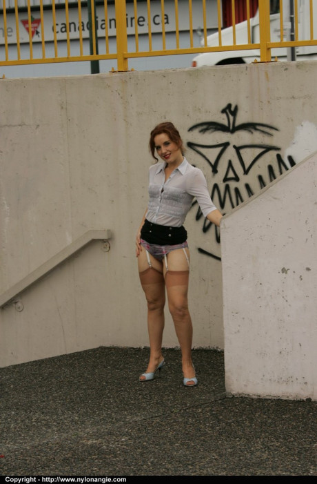 Old girl slutty Angie takes a piss outdoors in retro nylons