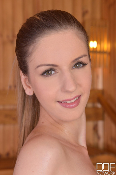 Hot amateur babe Stella Cox plays with her massive melons and vagina in the sauna