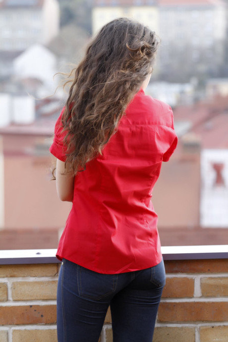 Brunette teenie Soika A slowly doffs her clothes and teases with her titties