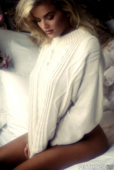 Blonde cutie Jisel flaunts her enormous titties & furry cunt in solo action