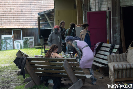 Gender fluid body modifiers get somewhat undressed while having a backyard party