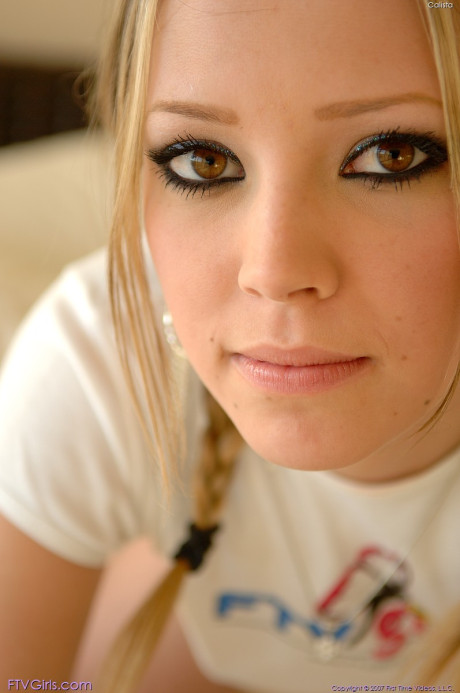 Pretty amateur babe Callista toys her pink snatch and exposes it up close