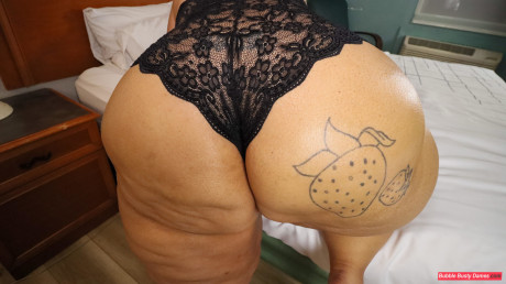 SSBBW Strawberrys Delight shows her huge ass in black underwear