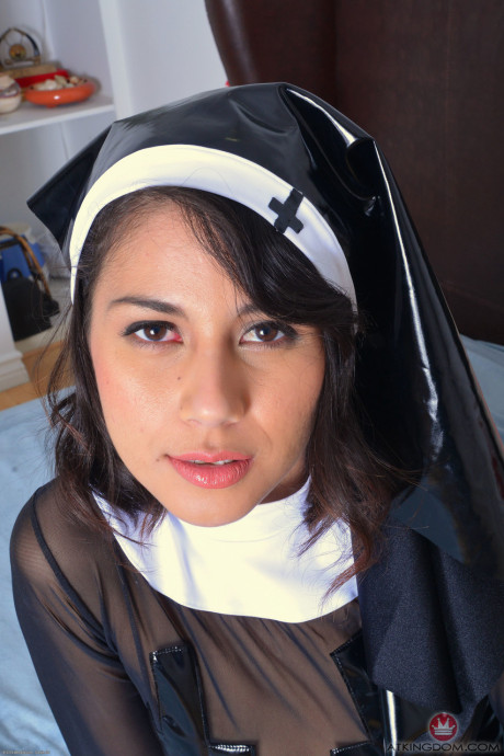 Beautiful sleazy nun Penelope Reed shows her inviting hairy twat up close
