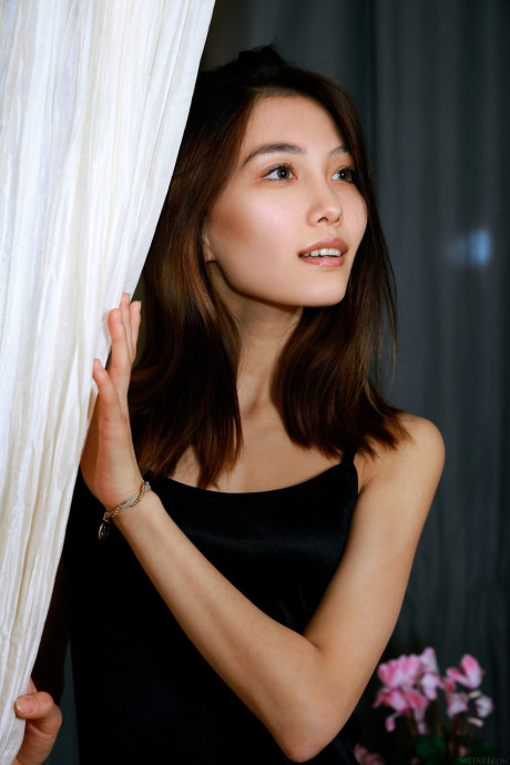Adorable asian young Anna Aki reveals her skinny body and poses in a solo