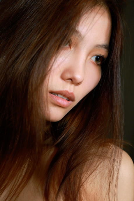 Adorable asian young Anna Aki reveals her skinny body and poses in a solo