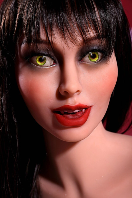 Cute sex doll with striking eyes poses in a bathroom and bathtub