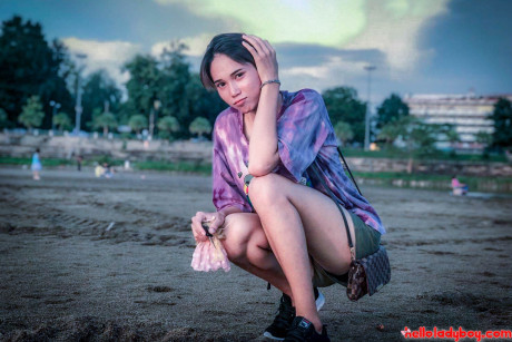 Stunning oriental transexual posing fully clothed in public in her own compilation