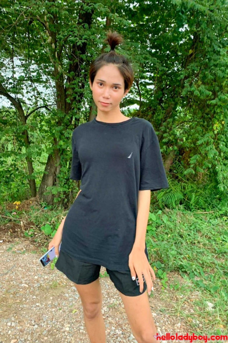 Stunning oriental transexual posing fully clothed in public in her own compilation