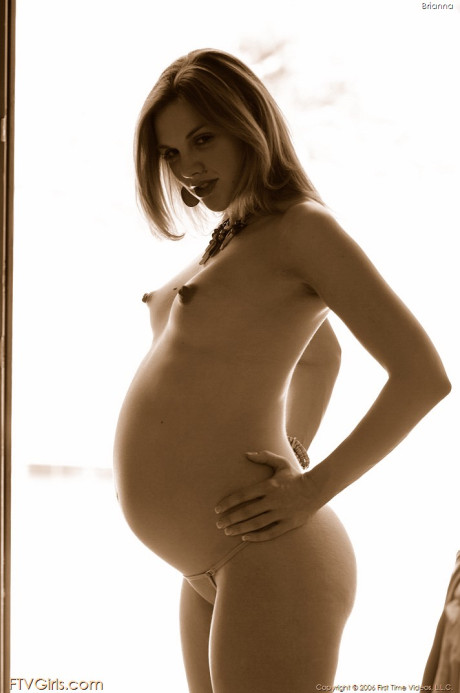 Attractive pregnant babe with lovely nips Brianna reveals her body in a solo
