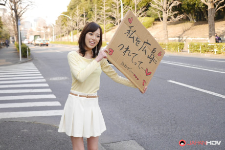 Asian sweetie Shiori Yamate reveals her hot boobs and licks a schlong in a car