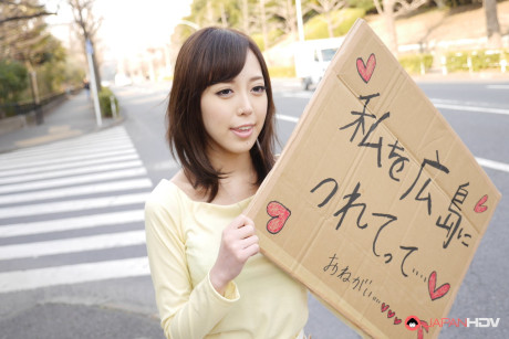 Asian sweetie Shiori Yamate reveals her hot boobs and licks a schlong in a car