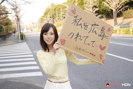 Asian sweetie Shiori Yamate reveals her hot boobs and licks a schlong in a car