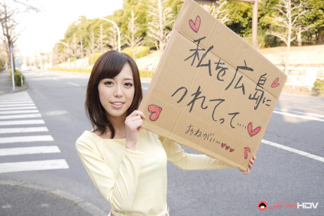 Asian sweetie Shiori Yamate reveals her hot boobs and licks a schlong in a car