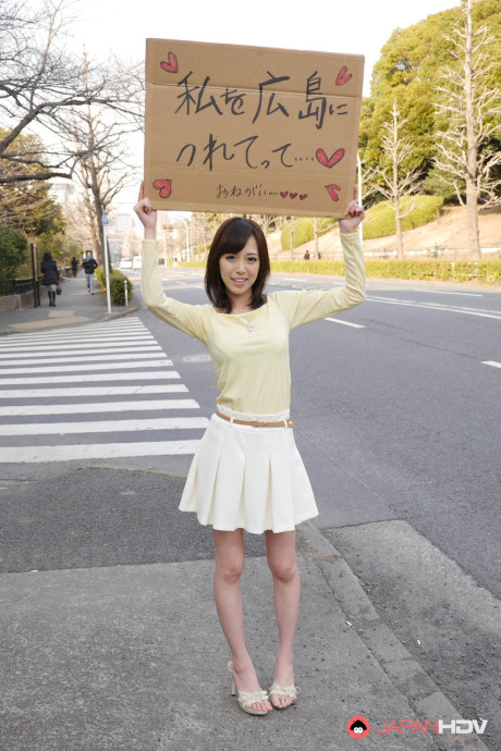 Asian sweetie Shiori Yamate reveals her hot boobs and licks a schlong in a car