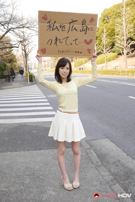 Asian sweetie Shiori Yamate reveals her hot boobs and licks a schlong in a car
