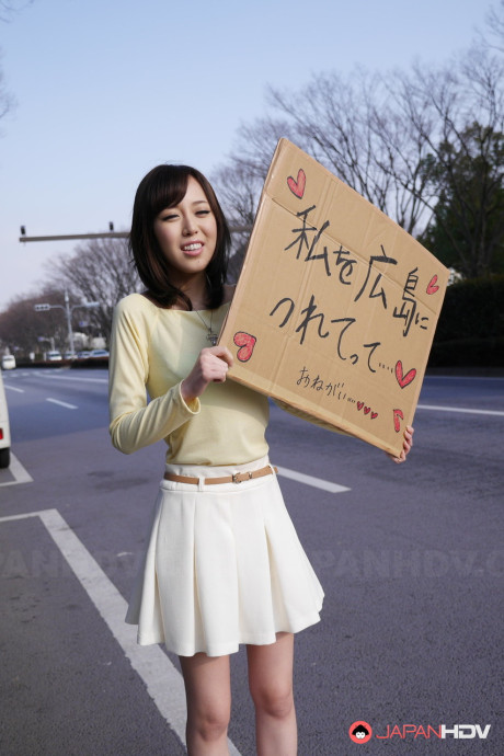Asian sweetie Shiori Yamate reveals her hot boobs and licks a schlong in a car