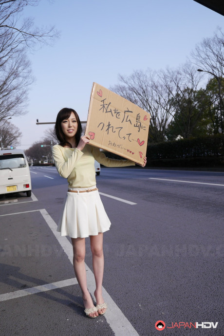 Asian sweetie Shiori Yamate reveals her hot boobs and licks a schlong in a car