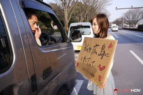 Asian sweetie Shiori Yamate reveals her hot boobs and licks a schlong in a car