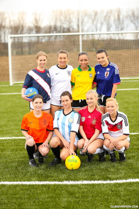 Naughty soccer babes strip each other and flaunt their melons on a soccer pitch
