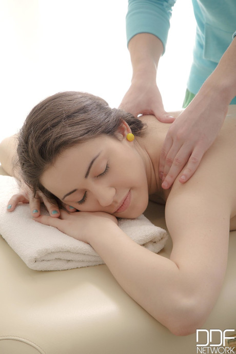 Teenie with a pretty shaved twat Gabi fucks her masseur's penis & gets creampied