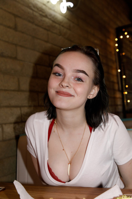 Brunette teenie Vonnie Bean teases with her monstrous juggs in a full tub