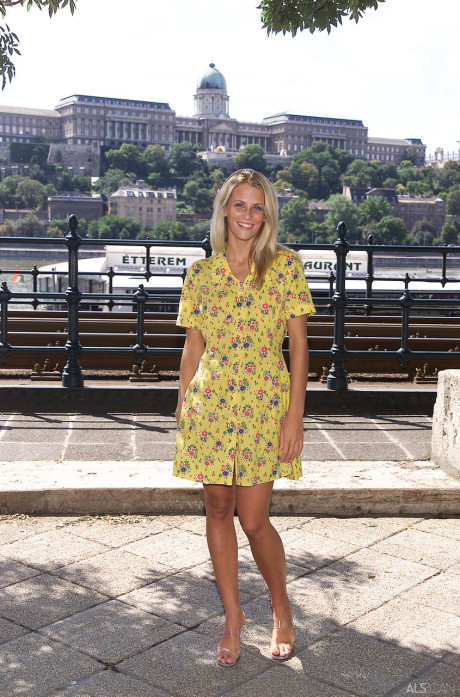 Blondy teenie Krisztina removes her yellow dress and flaunts her body in public