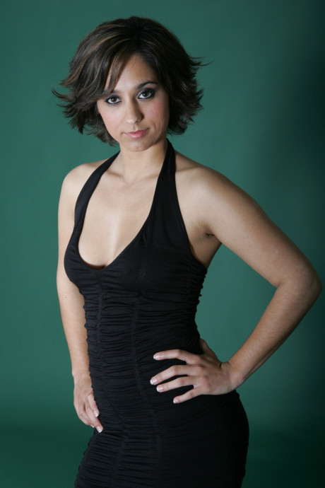 Fine brunette model Shandra posing in her provocative outfits in a solo