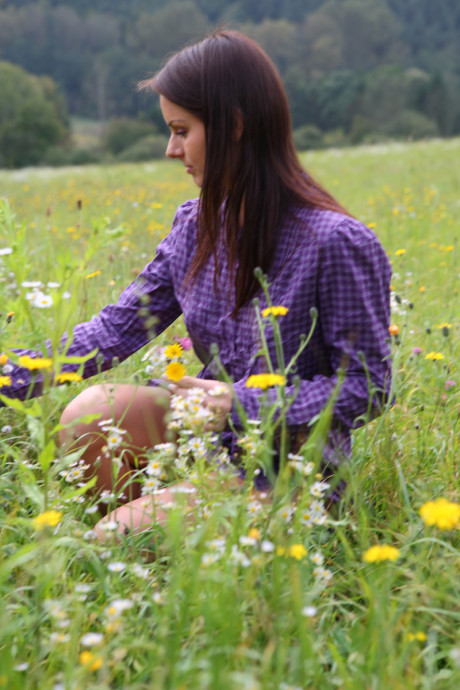 Young teenie bitch GF broad Gloria gets completely nude while picking flowers in a field