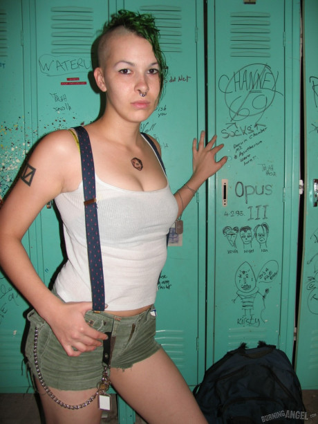 Smoking green haired fetish freak Chapel poses nude in the locker room