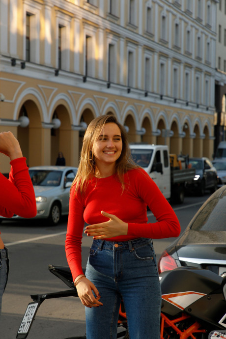 Attractive models in red sweaters Disha & Alevtina Batman show their asses together