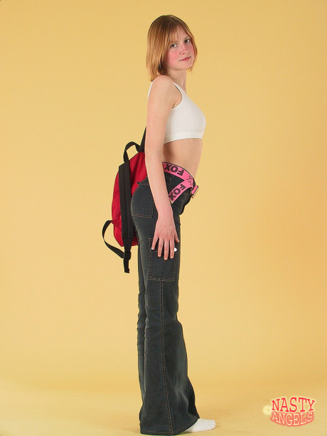 European newbie Lettie undresses at the casting & shows her innocent body