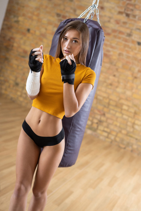 Attractive athlete Mina strips and masturbates after her boxing practice