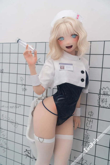 Blonde sex doll masturbates in a bathroom while wearing a black garter belt