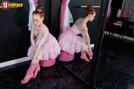 Red Hair ballerina Dolly Little strips down to pink leg warmers and slippers
