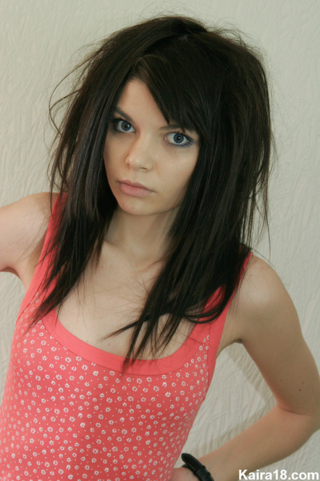 Thin teen Kaira 18 shows her new tattoos while getting naked on her bed