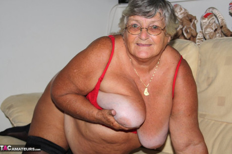 Morbidly obese nan granny Libby sucks a nipple before spreading her twat