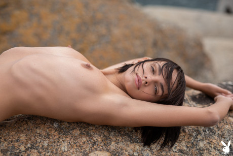 Glamorous French skank girl girl Ariel strips on the beach and displays her perfect body