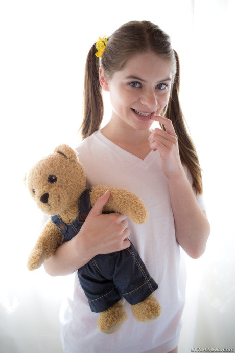 Fresh young sweetie Alice March shows off her bitty parts in socks with Teddy in hand