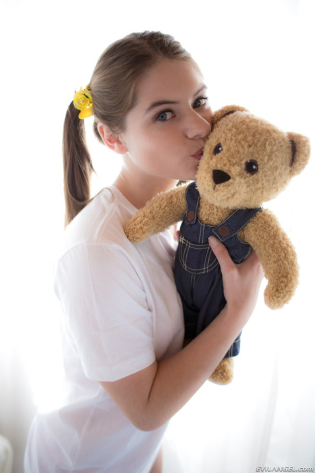 Fresh young sweetie Alice March shows off her bitty parts in socks with Teddy in hand